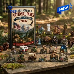 Front view of National Parks Adventure 2026 Advent Calendar box alongside twenty four miniature park figurines on a rustic wooden table.