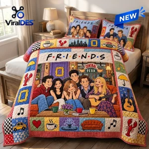 Front view of Friends Central Perk patchwork quilt set on a wooden bed.