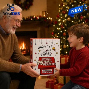 An older man and a young boy holding a Peanuts 75th Anniversary Collectible Advent Calendar in a holiday living room setting.