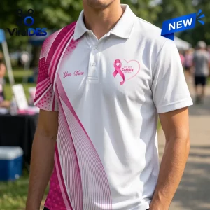 Front view of a white polo shirt with pink ribbon graphics, diagonal stripes, and placeholder text.