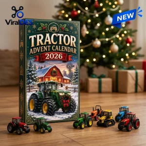 Front view of the Tractor Advent Calendar 2026 box with toy tractors placed in front on a wooden floor.