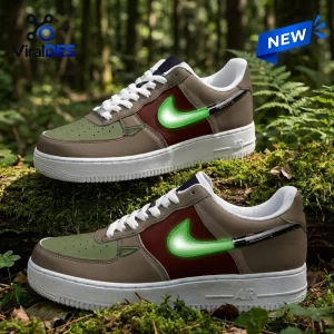 Side view of Star Wars Yoda Brown Custom Air Force 1 Sneakers resting on mossy logs in a forest.