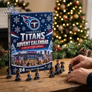 Front view of the Tennessee Titans 2026 Advent Calendar box alongside mini figurines on a wooden table.