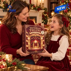 Mother and daughter holding the Victorian Theatre 2026 Advent Calendar together by a Christmas tree.