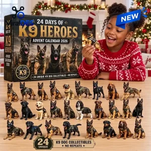 Front view of smiling child holding a German Shepherd toy next to K9 Heroes Advent Calendar 2026 and displayed dog figurines.