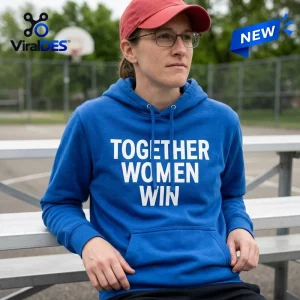 Front view of a person wearing the Indiana Fever Blue Together Women Win Hoodie on a basketball court.
