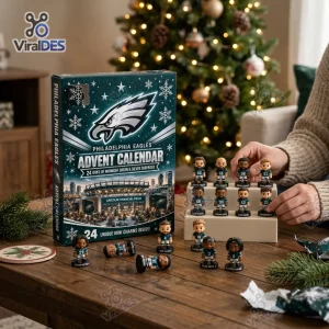 Front view of Philadelphia Eagles mini figures advent calendar box with small player figurines displayed on wooden table.