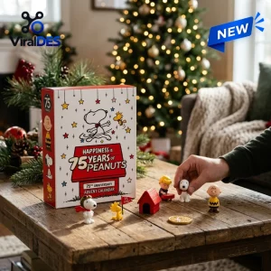 Front view of Peanuts 75th Anniversary Collectible Advent Calendar with figurines on wooden table.