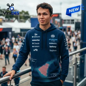Front view of a navy blue Williams F1 Team hoodie featuring sponsor logos and gradient graphics.