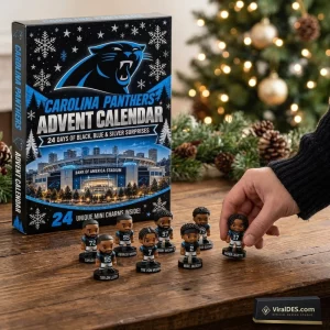 Front view of Carolina Panthers 2026 Advent Calendar box with mini figurines displayed on a wooden table.