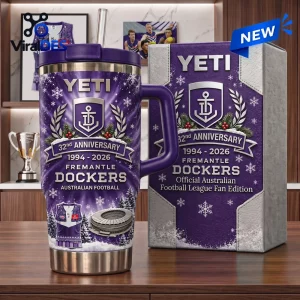 Front view of Fremantle Dockers 32nd Anniversary YETI Tumbler with purple winter graphic and box.
