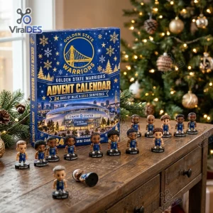 Front view of the Golden State Warriors 2026 Advent Calendar box with miniature figurines on a wooden table.