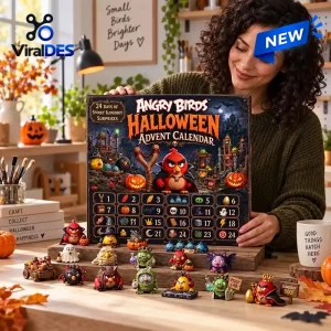 Woman holding an Angry Birds Halloween Advent Calendar 2026 with toy figurines displayed on tiers.
