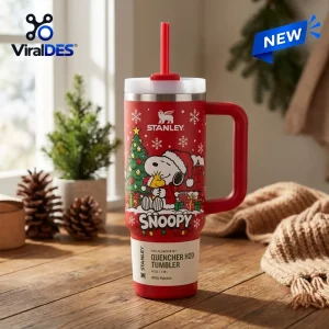 Front view of Snoopy Christmas Stanley 40oz Tumbler in red with holiday graphic.