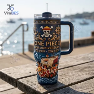 Front view of a One Piece 30th Anniversary 1997 - 2027 handle tumbler cup on an outdoor wooden table.