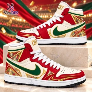 Side view of Cristiano Ronaldo Portugal Red Air Jordan 1 High Top Sneakers with green swooshes and gold accents.