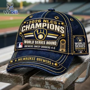 Front view of the Milwaukee Brewers 2026 NLCS Champions Cap resting on a wooden bench.