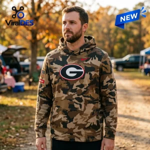 Man wearing University of Georgia 2026 Military Appreciation Camo Hoodie outdoors.