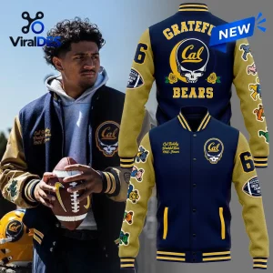 Man wearing California Golden Bears NCAA x Grateful Dead Varsity Jacket holding a football.