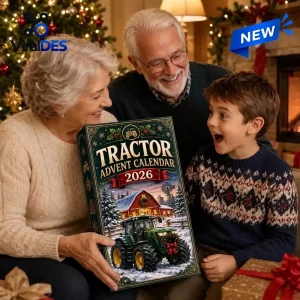 Grandparents and a boy holding the Tractor Advent Calendar 2026 indoors near a Christmas tree.