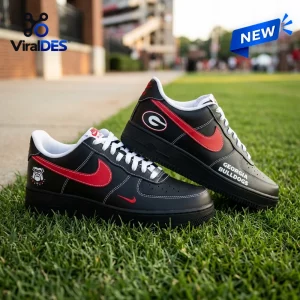 Side view of Georgia Bulldogs Black In Black Air Force 1 Sneaker resting on green grass.