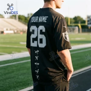Back view of the Las Vegas Raiders Fourth Wing Day Football Jersey featuring number 26 and dragon graphics.