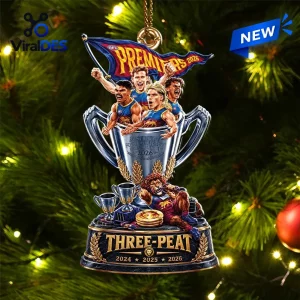 Front view of Brisbane Lions Three-Peat 2026 Christmas Ornament hanging on a lit tree.