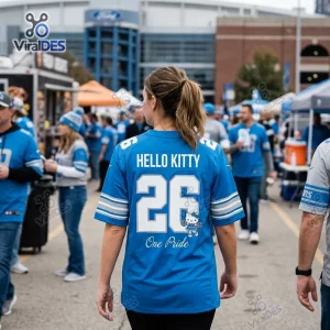 Back view of a person wearing a blue Detroit Lions football jersey with the name Hello Kitty and number 26 on it.