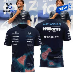 Front and back view of a dark blue Williams F1 team shirt featuring sponsor logos and geometric graphics.