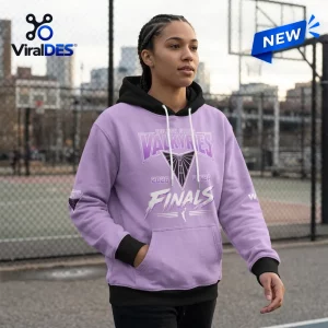 Front view of a person wearing a lavender hoodie featuring Valkyries Finals graphics and black accents outdoors.