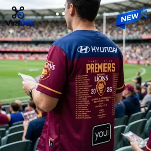 Rear view of a Brisbane Lions 2026 AFL Premiers baseball jersey worn in a stadium setting.