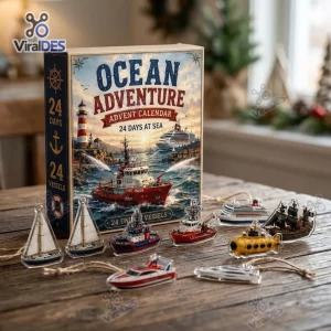 Front view of an Ocean Adventure Ship Advent Calendar box with miniature toy vessels displayed on a wooden table.
