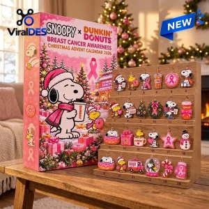 Front view of Snoopy x Dunkin Donuts 2026 Christmas Advent Calendar with pink box and wooden display rack.
