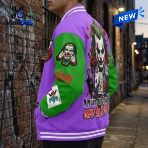 Side view of a DC Comics Joker Quote Baseball Jacket featuring purple and green panels with graphics.