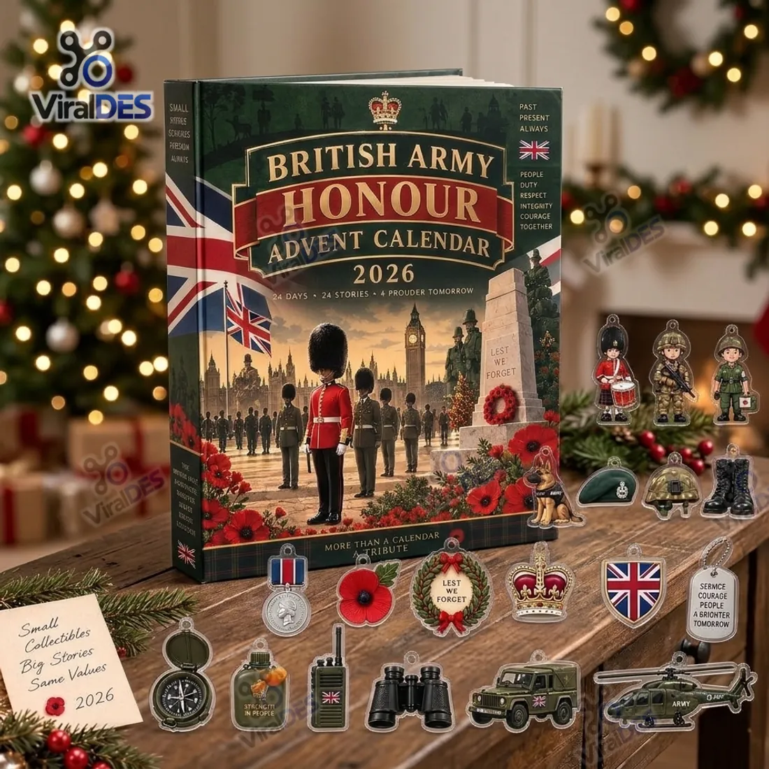 British Army Honour Advent Calendar 2026 hardcover collector box standing on a wooden table beside flat acrylic ornaments of soldiers, remembrance poppy, wreath, crown, and military vehicles
