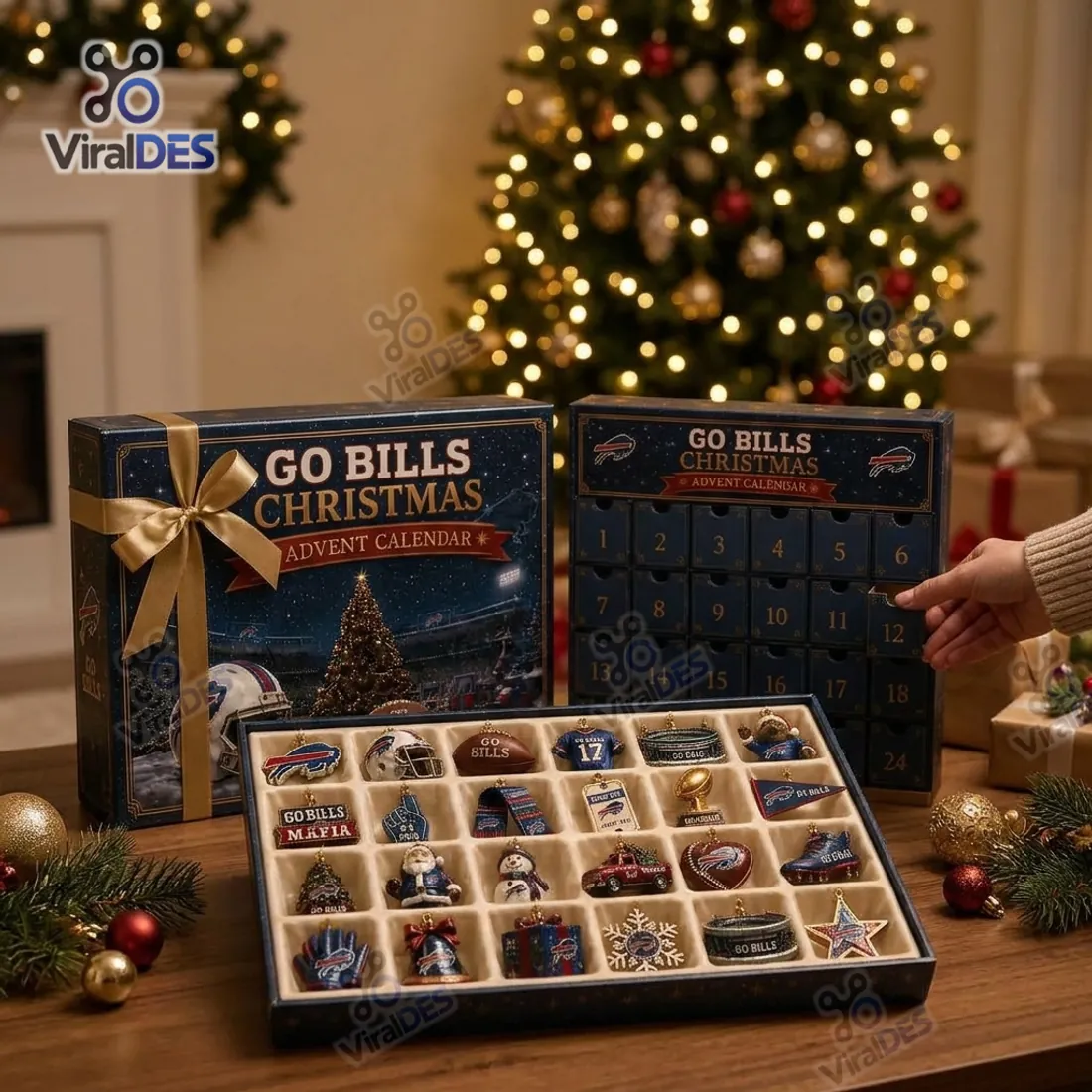 Hand pulling out drawer 12 from the Buffalo Bills Christmas Advent Calendar 24-compartment cabinet alongside the tray of 24 ornaments