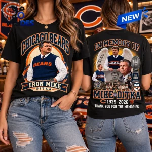 Front and back view of a black t-shirt featuring graphic designs dedicated to Iron Mike Ditka and the Chicago Bears.