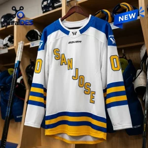 Front view of PWHL San Jose 2026 Away Custom Hockey Jersey hanging in a locker room.