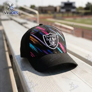 Front view of Las Vegas Raiders NFL Crucial Catch 2026 black cap resting on stadium bleachers.