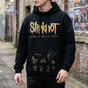 Front view of a black hoodie with gold tour graphics and signatures.
