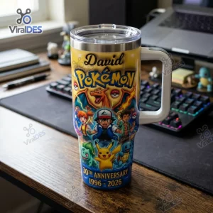 Front view of a Pokemon 30th Anniversary 1996-2026 Tumbler Cup featuring custom name David and character graphics on a desk.
