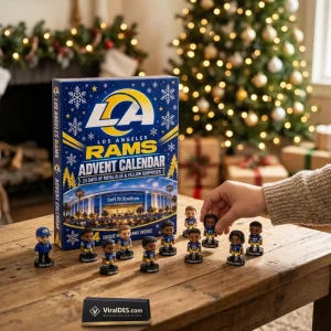 Front view of Los Angeles Rams 2026 Advent Calendar box with miniature figurines on a wooden table.