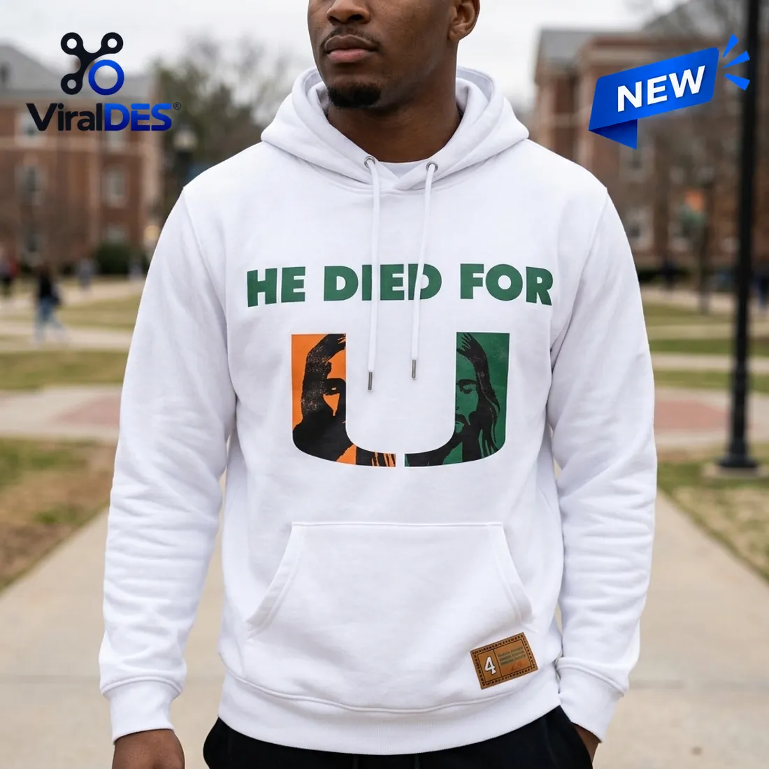 Outdoor campus view of the Faith Walker He Died For Us White Hoodie highlighting the split orange-and-green U chest graphic and number 4 hem patch