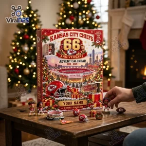 Front view of Kansas City Chiefs 66th Anniversary Advent Calendar on wooden table with mini figures.
