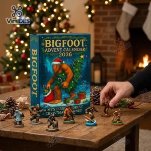 Front view of Bigfoot 2026 Advent Calendar box with miniature figures displayed on a wooden table.