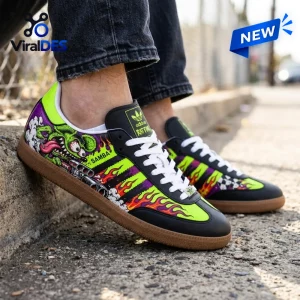 Side view of Rat Fink Hot Rod Black Samba Shoes worn outdoors on concrete.