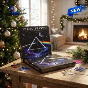 Front view of Pink Floyd 2026 Christmas Advent Calendar open on a wooden table with acrylic ornaments.