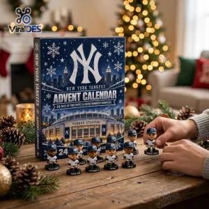 Front view of New York Yankees Advent Calendar with miniature player figurines on a wooden table near a decorated tree.