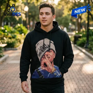 Man wearing a New Zealand Warriors Leka Halasima Black Hoodie with a large graphic print.
