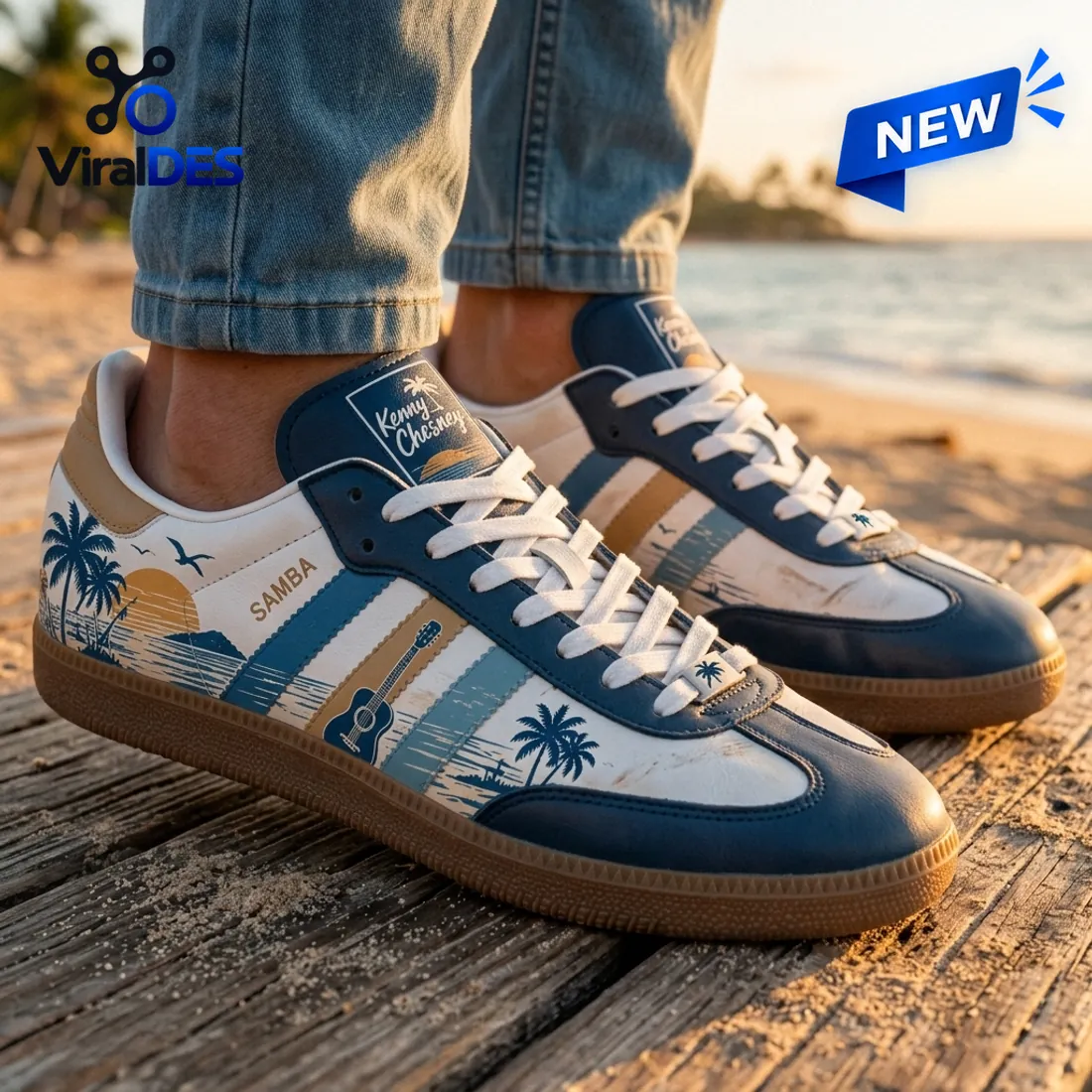 Closeup of Kenny Chesney Blue Samba Sneakers worn on a wooden dock with a tropical beach background.